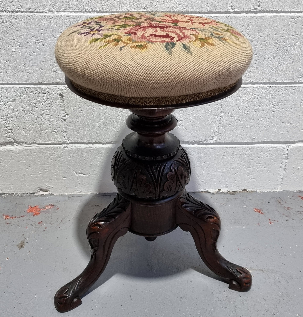 Beautiful Late Victorian Floral tapestry covered revolving piano stool. It is in very good original detailed condition. It has a original David Jones label underneath .