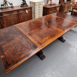 Renaissance style Oak extension table with parquetry top and twin pedestal base. The table extends by pulling out an extension leaf either side making it 287 cm long. Sourced from France and in good original detailed condition.