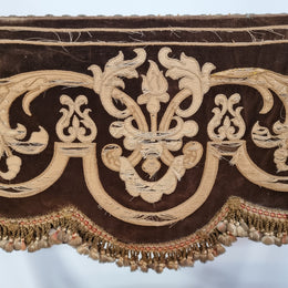 Beautifully carved Walnut Egyptian Revival armchair with amazing hand sewn Stumpwork embroidery coverings. In good original detailed condition.