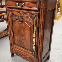 Louis 15th style oak 19th century cabinet with lovely brass hinges, handles & charming carving.  Circ: 1860's. In good original condition.