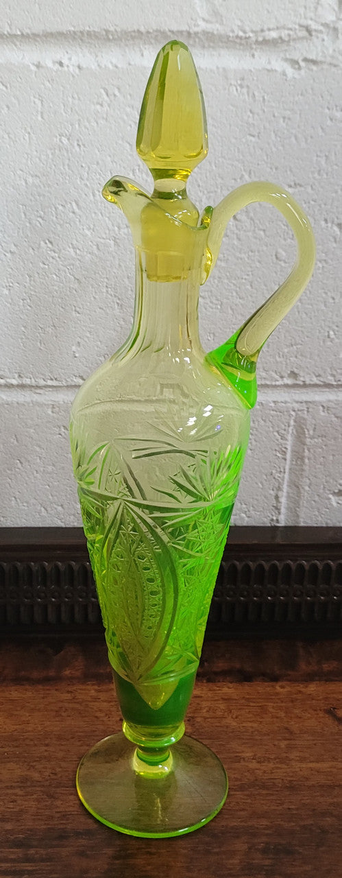 Stunning Uranium glass decanter and stopper. Great shape and height of 30.5cm