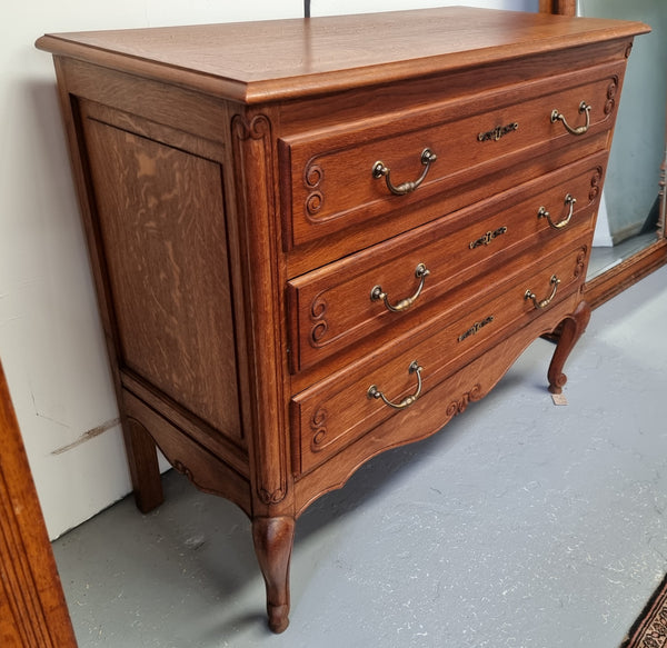 French Provincial Oak chest of three drawers. In good original detailed condition.