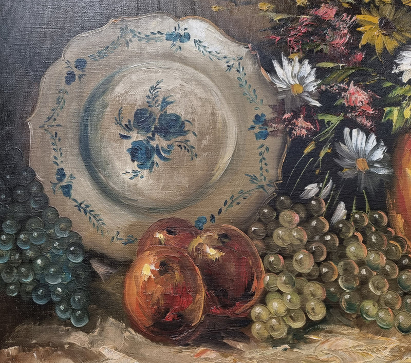 Beautiful signed oil on canvas of a still life framed in an ornate frame. Sourced in France and in good original condition.