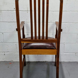 A very comfortable Black Wood Period leather seat armchair. In leather and chair are in good original condition.