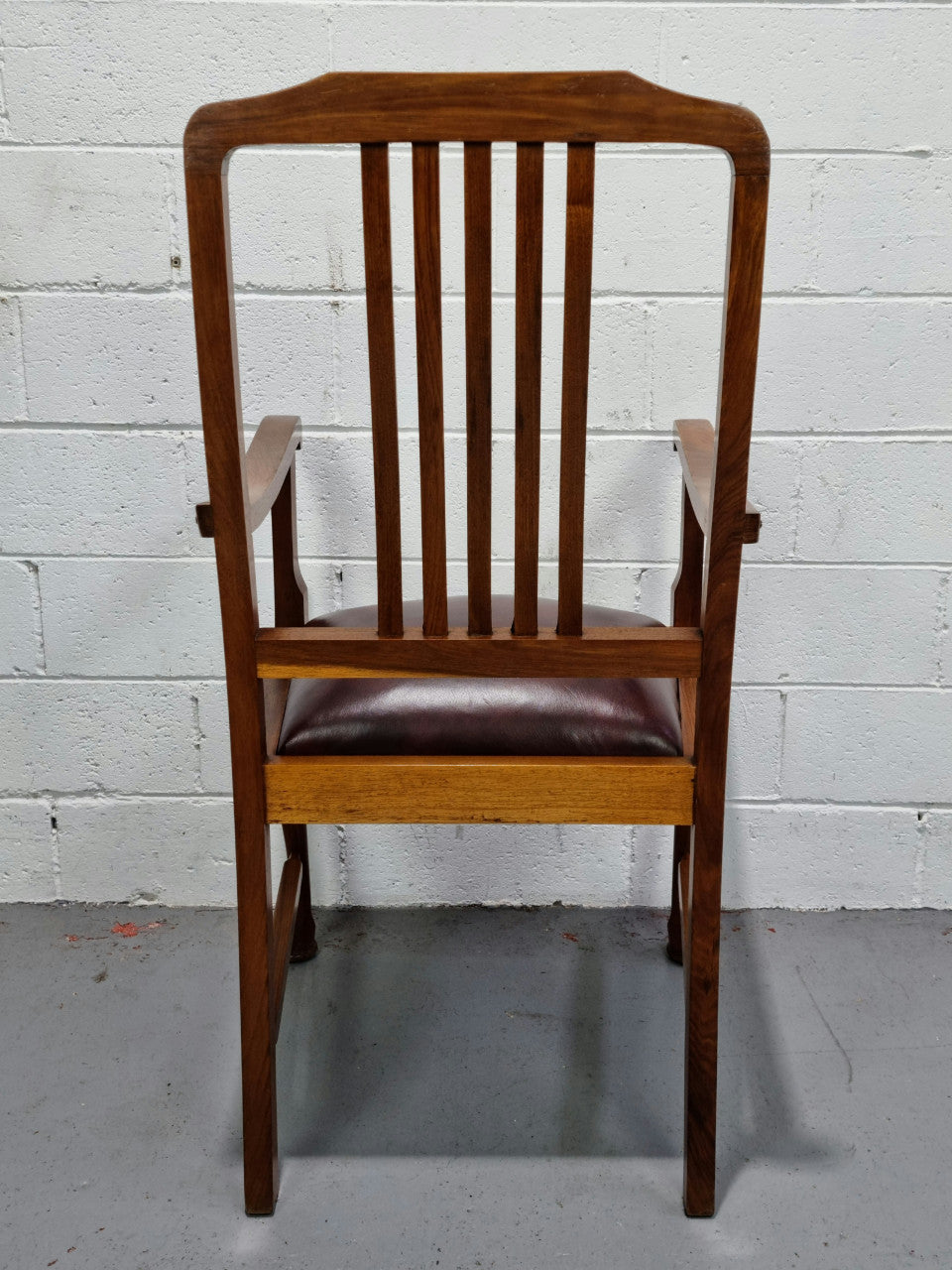 A very comfortable Black Wood Period leather seat armchair. In leather and chair are in good original condition.