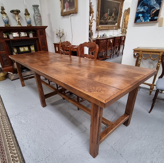 Fabulous French Cherrywood farmhouse dining table with a stretcher base and would easily sit 10 people comfortably in fantastic condition.