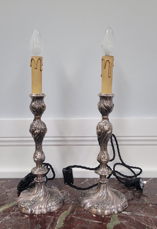 Pair of Antique French Silver candlestick table lamps with new wiring. In good original condition.