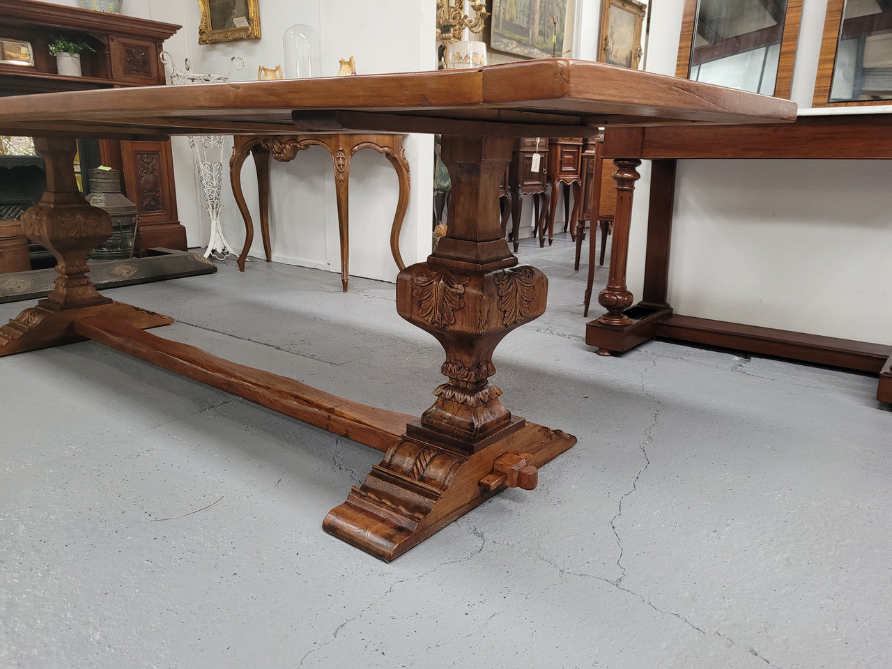 French style reclaimed Elm Farmhouse table with stretcher base and amazing carving underneath. Table can sit 10-12 people and is in good original detailed condition.