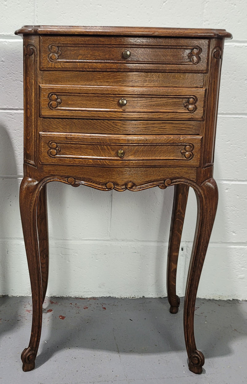 Lovely Louis XV style oak bedside cabinets with three drawers. In great original detailed condition.