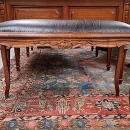 Impressive French Louis 15th style walnut upholstered duet leather stool. Very Good Condition.  Circa: 1930’s, sourced in France.