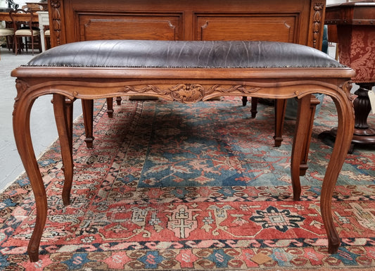 Impressive French Louis 15th style walnut upholstered duet leather stool. Very Good Condition.  Circa: 1930’s, sourced in France.
