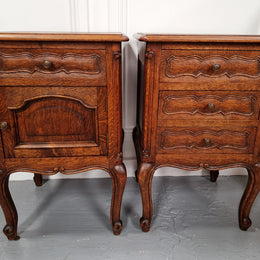 Pair of French provincial  Oak bedsides. They have attractive cravings and there is one with three drawers and other one has a cupboard and a drawer. They have been sourced from France and are in good original detailed condition.