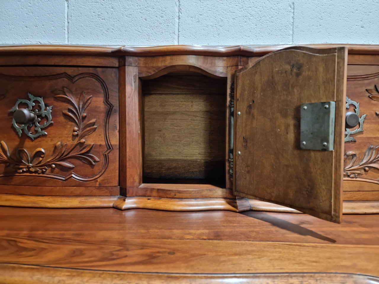 Stunning 19th Century French Walnut Buffet à Glissant from Provence, France. This is an exceptional charming piece and very functional with plenty of storage space, two large cupboards at the bottom, two drawers in the middle and two sliding doors either side at the top and finished off with a small central cupboard. In good original detailed condition.