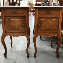 A beautiful pair of French walnut, marble top bedsides with a drawer and cupboard in good condition.