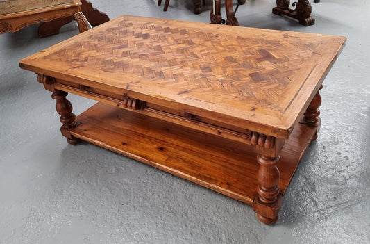 Beautiful Vintage Fruitwood, parquetry top coffee table with two drawers and storage underneath. It is in good original detailed condition.