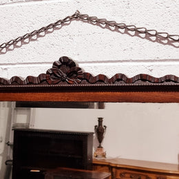 Attractive Edwardian rectangular wall mirror, with carved detail and beaded edge. Retaining it's original bevelled edge mirror and is in good original condition.