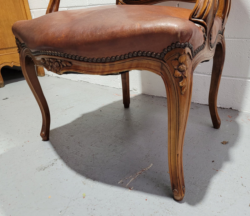 French Walnut Louis XV style desk chair with faux leather upholstery. The upholstery is in good original condition and very comfortable to sit in.