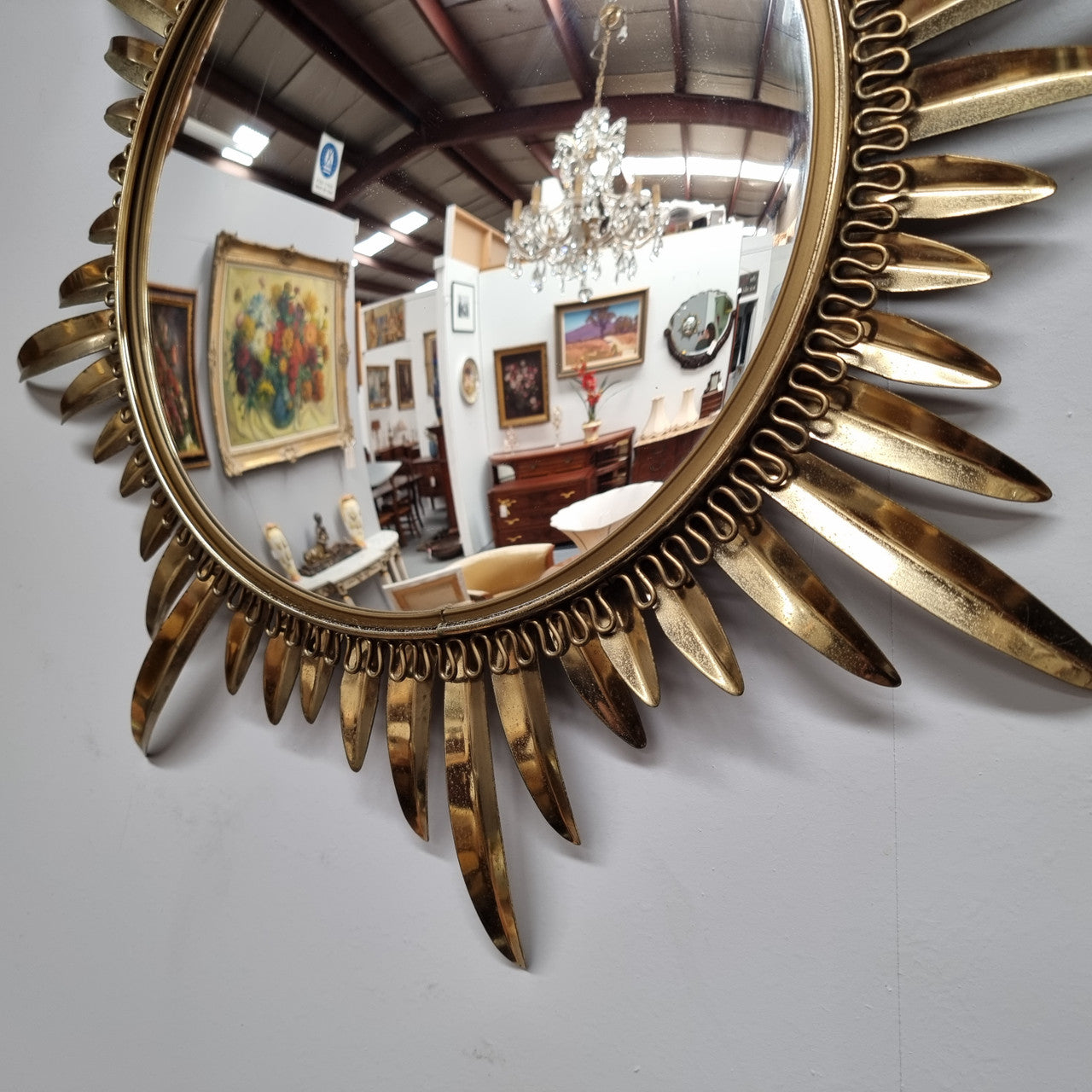 Stunning Vintage starburst convex mirror. It has been sourced from France and in good original detailed condition.