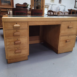 Parliament house desk made from Queensland maple. Desk has room numbers stamped to front. It's in good original condition. Purchased from a sale in old Parliament House in the late 1980's.