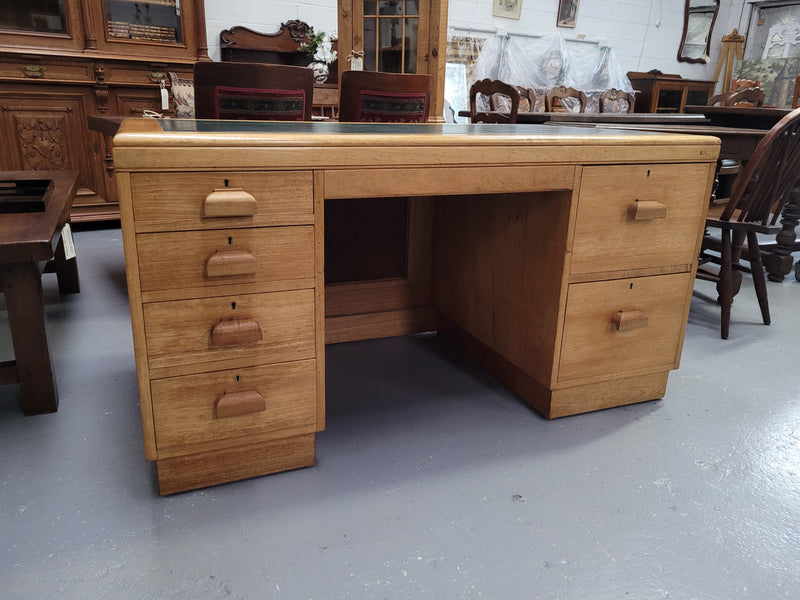 Parliament house desk made from Queensland maple. Desk has room numbers stamped to front. It's in good original condition. Purchased from a sale in old Parliament House in the late 1980's.