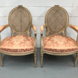 Pair Of French Louis XV Style Cane Back and Upholstered Seat Fauteuils