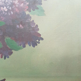 An Antique framed floral painting of lilacs in a vase on canvas, signed and in fantastic original condition.