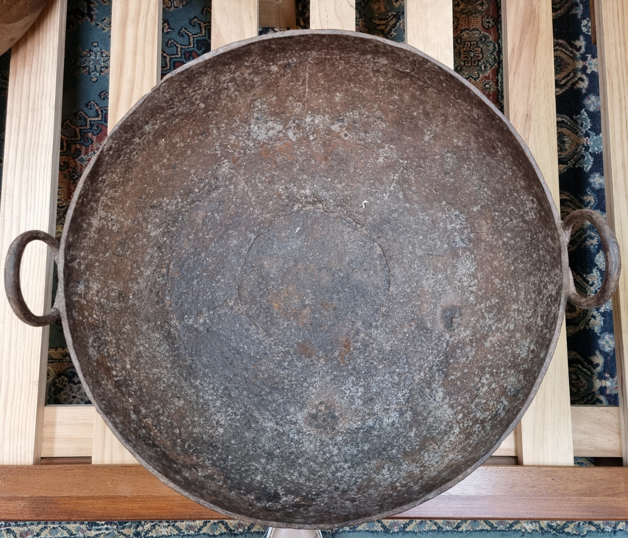 Early 19th Century rustic cast iron handled pan with a rich patina. It is in good original condition.