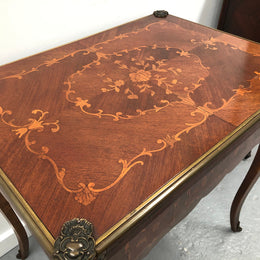 Beautiful french inlaid games table which includes internal drawers and bronze mounts. Internal drawers have counters and cards included.