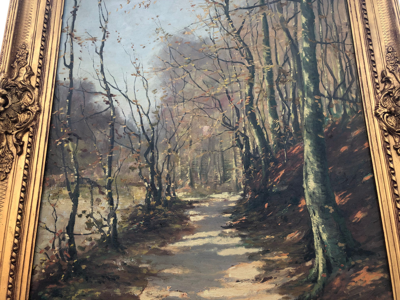 Beautiful Antique French oil on canvas of a path of trees, in a fabulous ornate frame and in good condition.