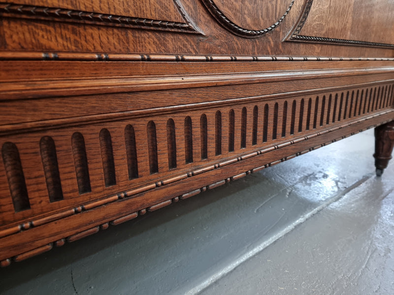 Elegant Louis XVI style French Oak queen size bed with a pair of matching inset marble top bedsides. The queen size beed comes with custom made bed slates and all you need to do is place your mattress on top. Bedsides and bed are in good original detailed condition.