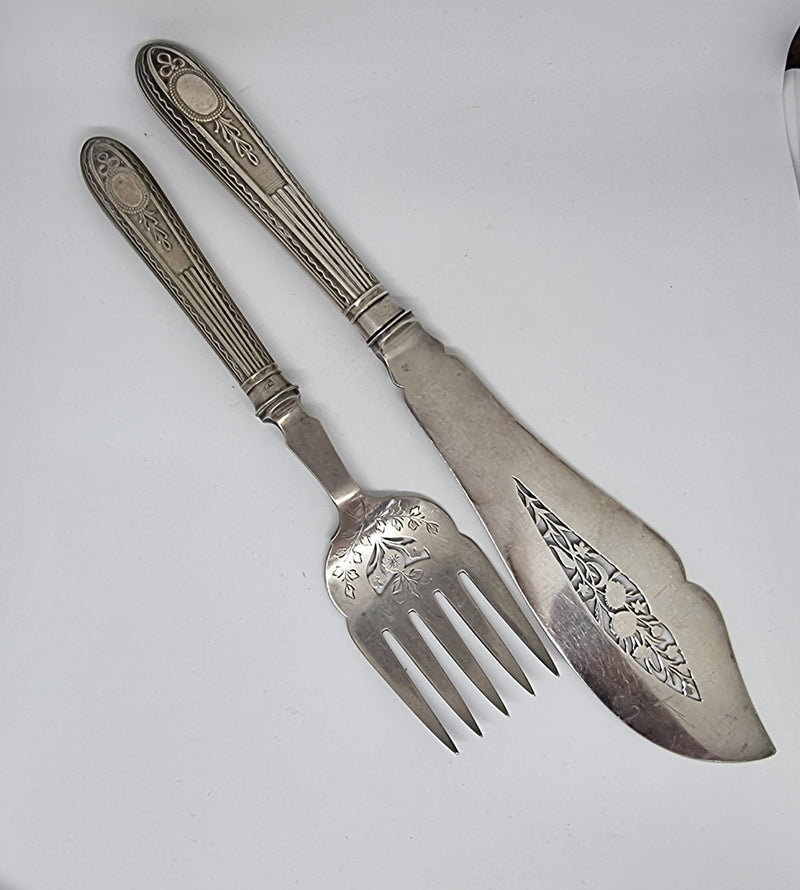 Very decorative pair of Edwardian silver plate Fish servers, in good original condition.