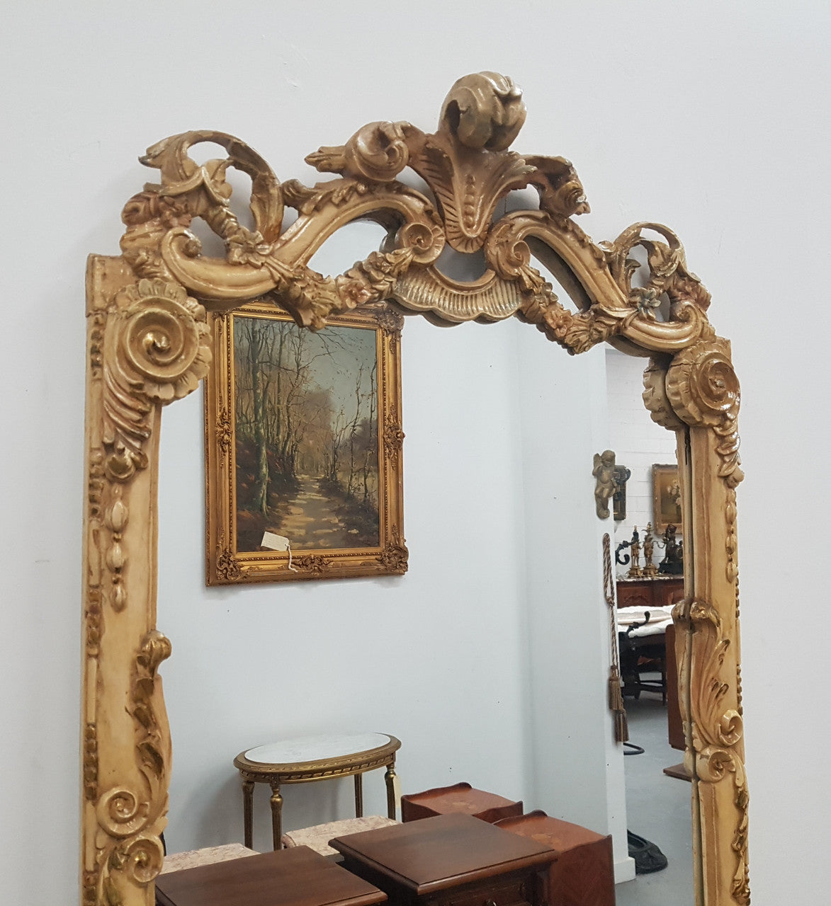Beautifully carved Italian Rococo style painted console/hall table and mirror. An amazing coloured marble top showing sections of gold veins and is in good condition. Mantle mirror is retaining it's original mirror and showing ages spots.
