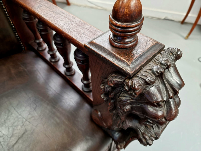 Superbly carved early 19th century newly upholstered French Oak hall seat of grand proportions and lovely details in good condition.