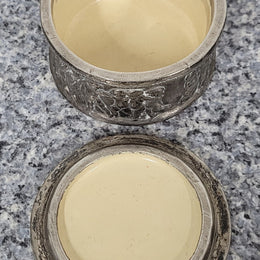 Unusual Antique silver over pottery Italian trinket box nicely decorated with Cherubs. It is in good original condition, please view photos as they help form part of the description.