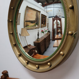 Large round French gilt framed convex mirror. It is a hard to find size with a total diameter of 67 cm. It has been sourced from France and is in good original condition.