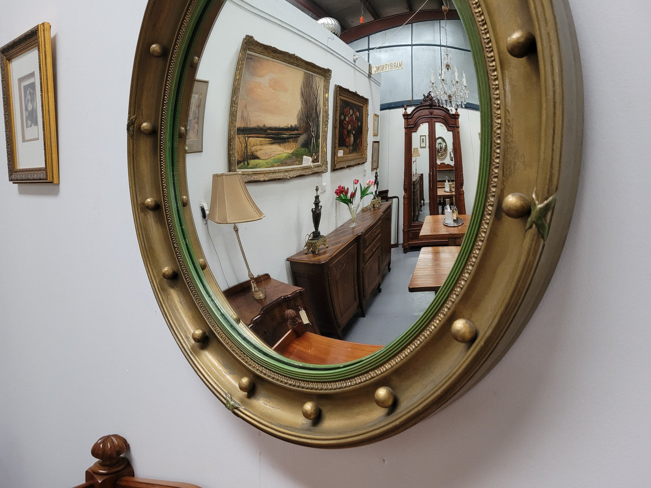 Large round French gilt framed convex mirror. It is a hard to find size with a total diameter of 67 cm. It has been sourced from France and is in good original condition.