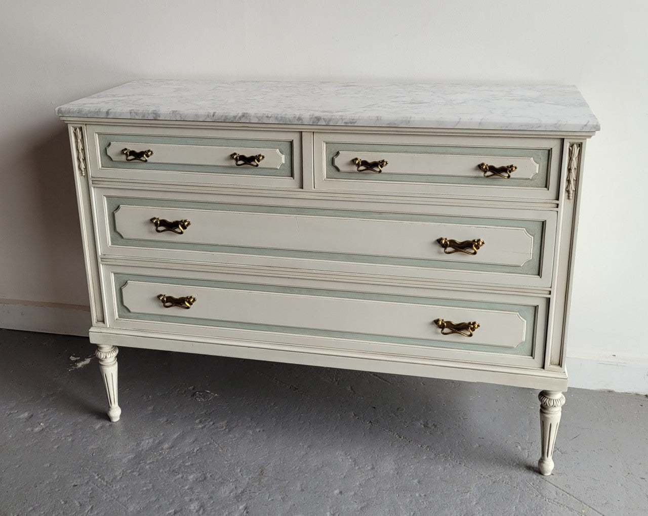 Charming Vintage French Louis 16th style original chalk painted chest of four drawers. It has been sourced from France and in good original condition.