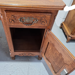 Beautifully carved french oak, faux partners desk with a lovely parquetry top and 6 drawers and 1 cupboard . In good original condition.