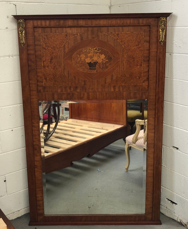 Beautiful Amboyna and Walnut Trumeau mirror. Has lovely parquetry inlay and is in good original condition.