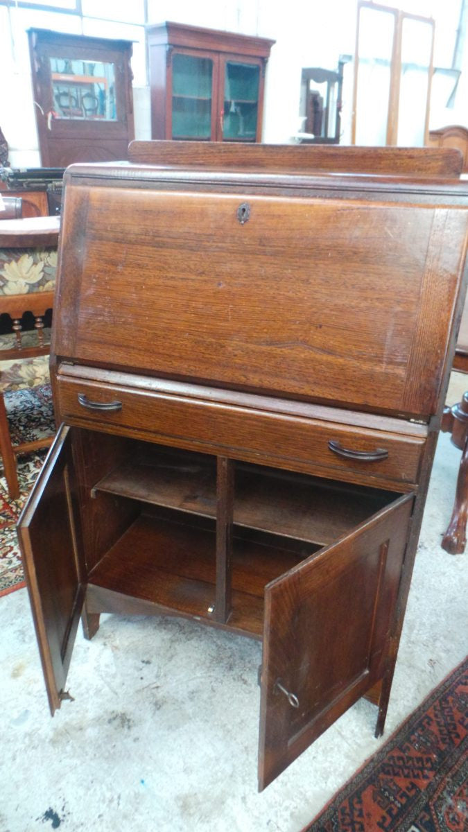 A Small Space Oak Secretaire