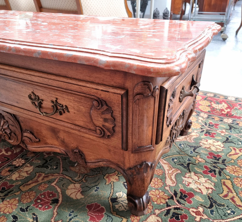 Amazing original walnut Louis XV style coffee table with a marble top, one drawer on either end and a faux drawer at the front. In good original detailed condition, sourced in France.