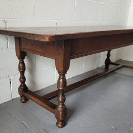 Rustic French Oak pedestal base coffee table. It is in good original detailed condition.
