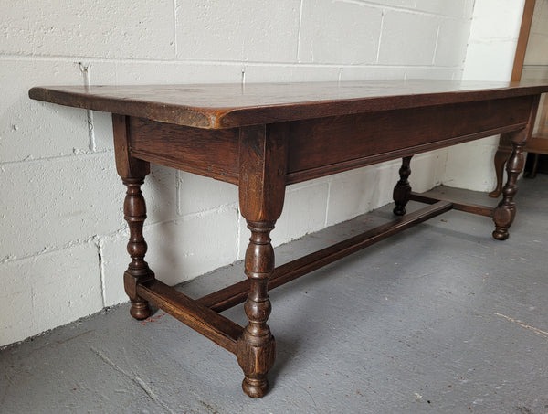 Rustic French Oak pedestal base coffee table. It is in good original detailed condition.