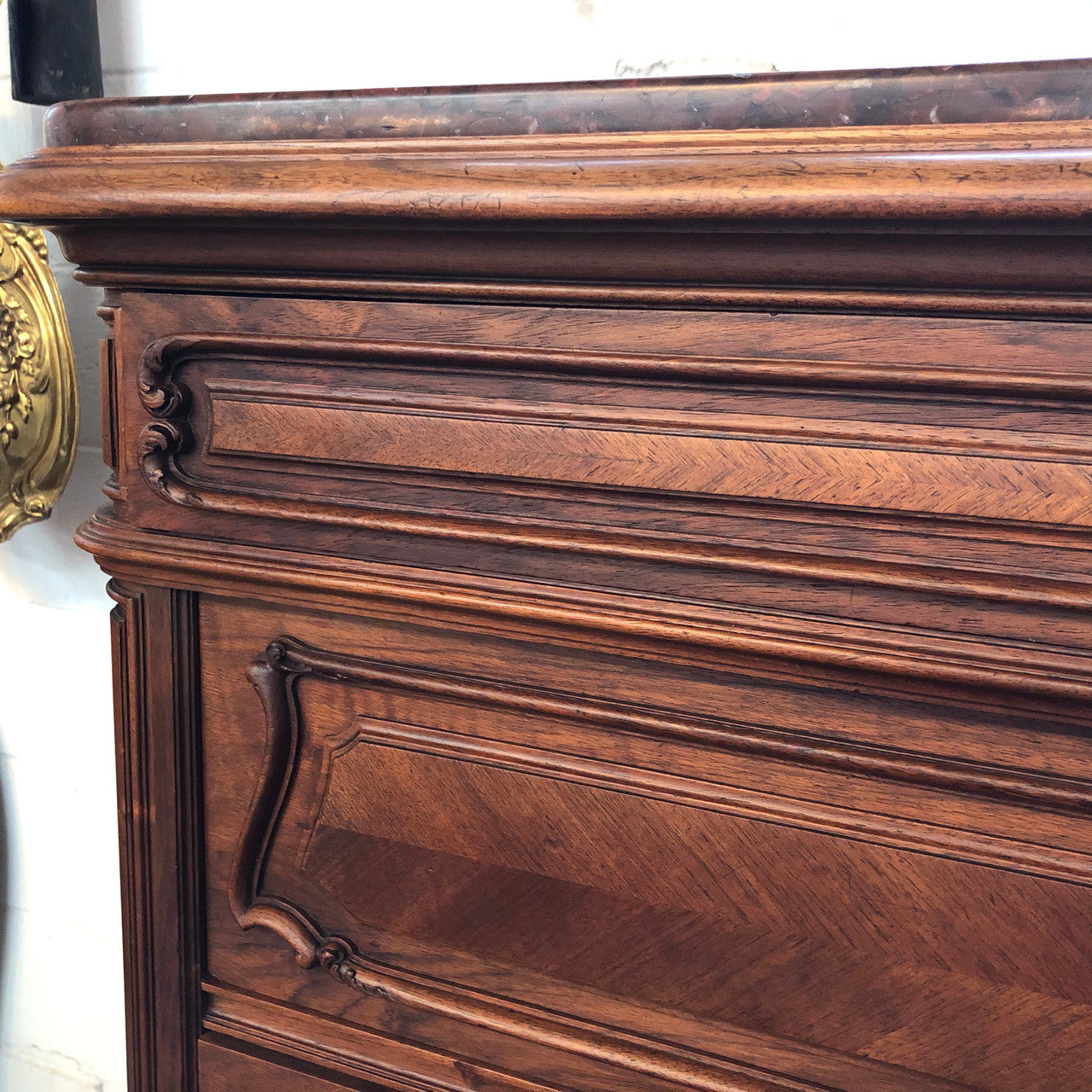 19th Century French Walnut five-drawer marble top commode. In good original detailed condition.